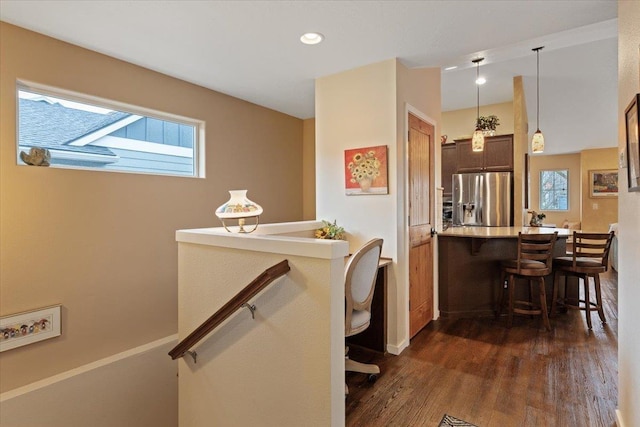 interior space with a wealth of natural light, wood finished floors, and recessed lighting