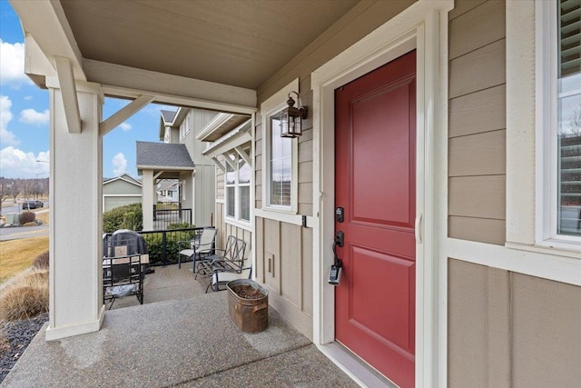 doorway to property with a porch