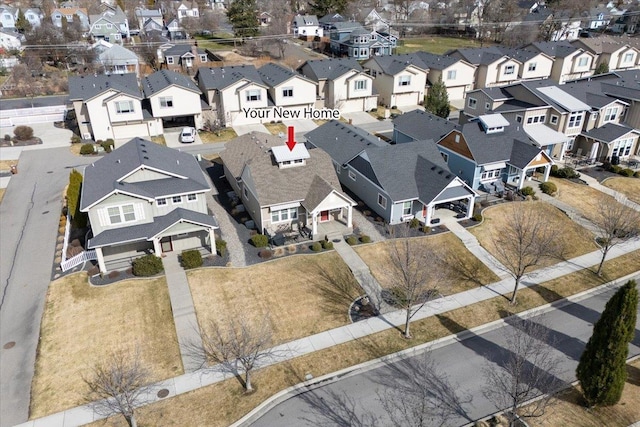 birds eye view of property with a residential view