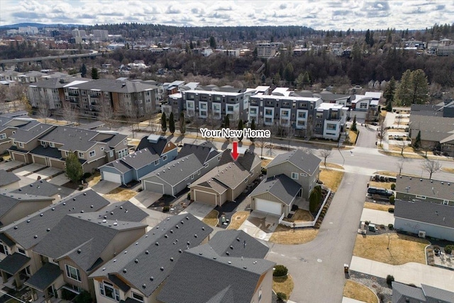 birds eye view of property with a residential view