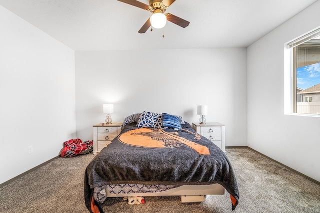 bedroom featuring carpet flooring, a ceiling fan, and baseboards