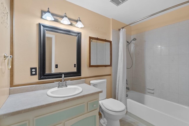 bathroom with shower / tub combo with curtain, toilet, vanity, and visible vents