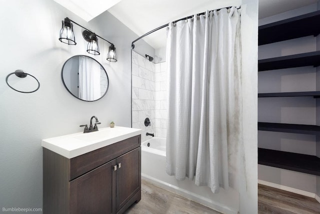 bathroom with vanity and shower / bath combo with shower curtain