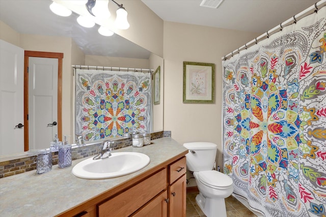 full bathroom with tasteful backsplash, visible vents, toilet, tile patterned floors, and vanity