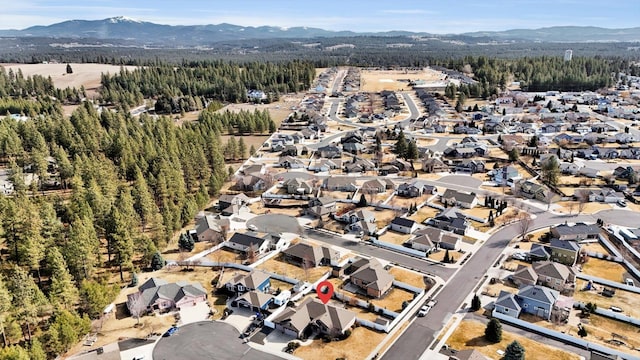 birds eye view of property featuring a residential view and a mountain view