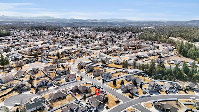 bird's eye view featuring a mountain view and a residential view