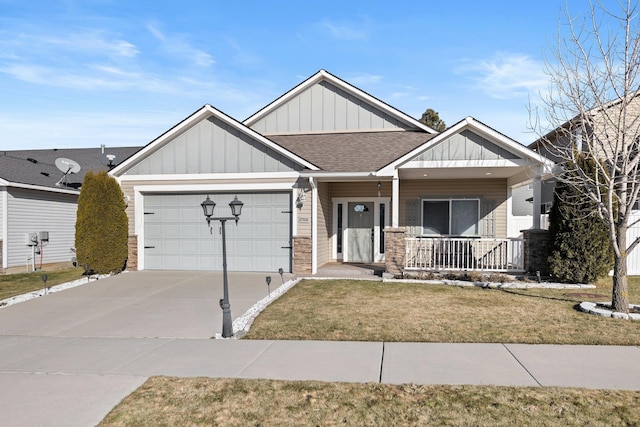 view of front of property featuring board and batten siding, roof with shingles, covered porch, a garage, and driveway