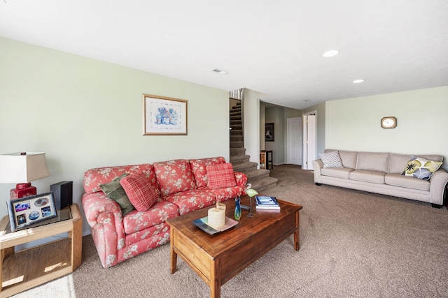 living room featuring stairs, recessed lighting, and carpet floors