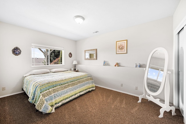 bedroom with visible vents, carpet floors, and baseboards