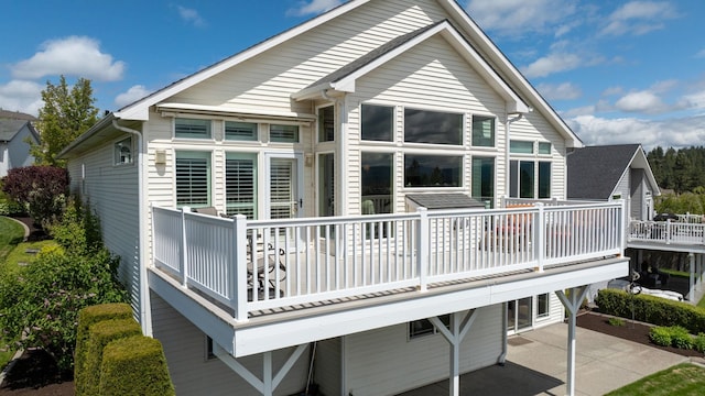 back of house with a patio