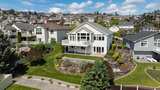 drone / aerial view with a residential view