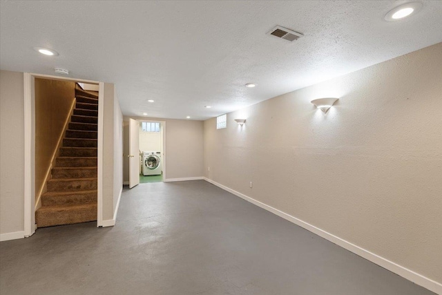 below grade area with recessed lighting, visible vents, washer / clothes dryer, and stairway