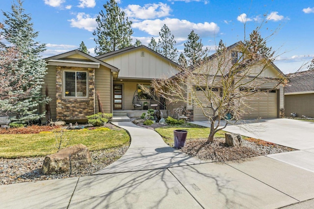 view of front of home featuring driveway, a porch, board and batten siding, a front yard, and a garage