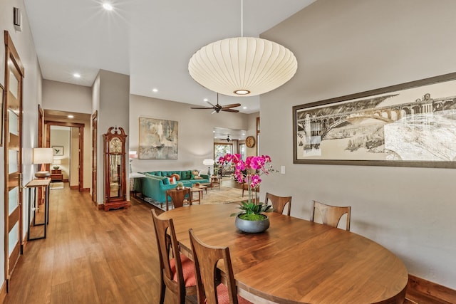 dining area featuring recessed lighting, a ceiling fan, and light wood finished floors