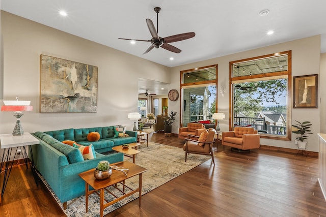 living area featuring recessed lighting, a ceiling fan, and hardwood / wood-style flooring