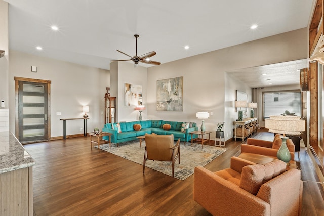 living room featuring recessed lighting, baseboards, a ceiling fan, and wood finished floors