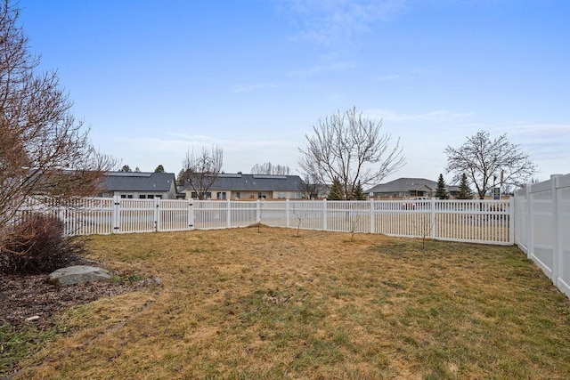 view of yard featuring a fenced backyard