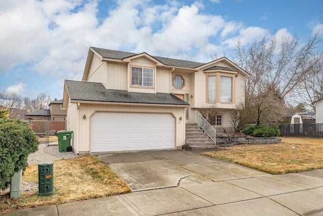 view of front of house featuring an attached garage, a shingled roof, driveway, and fence