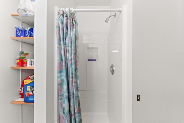 bathroom with a stall shower