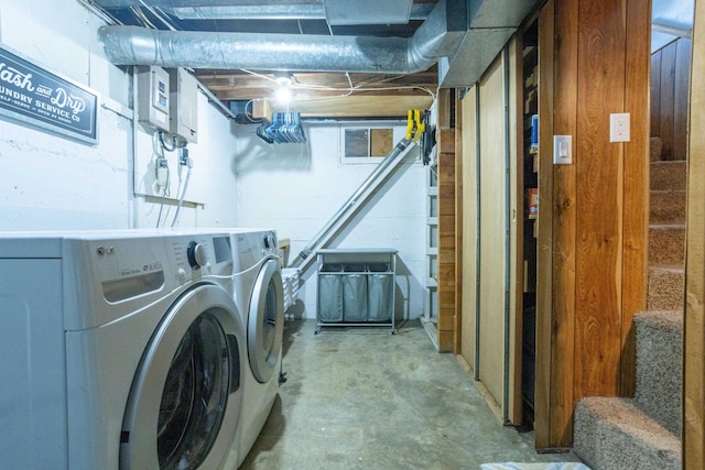 washroom featuring separate washer and dryer and laundry area