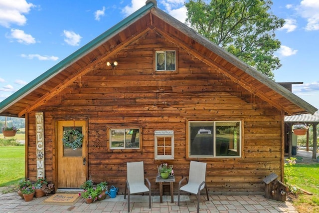 back of house featuring a patio