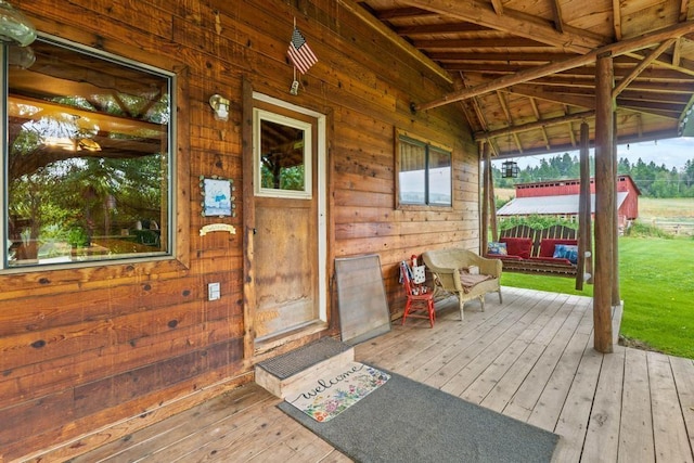 deck featuring a lawn