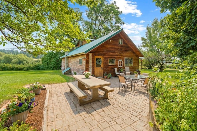 view of patio with outdoor dining area