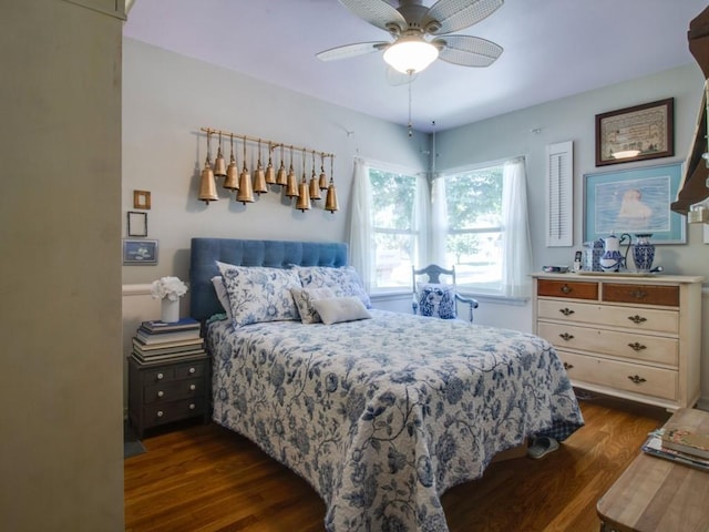 bedroom featuring dark wood-style flooring and ceiling fan