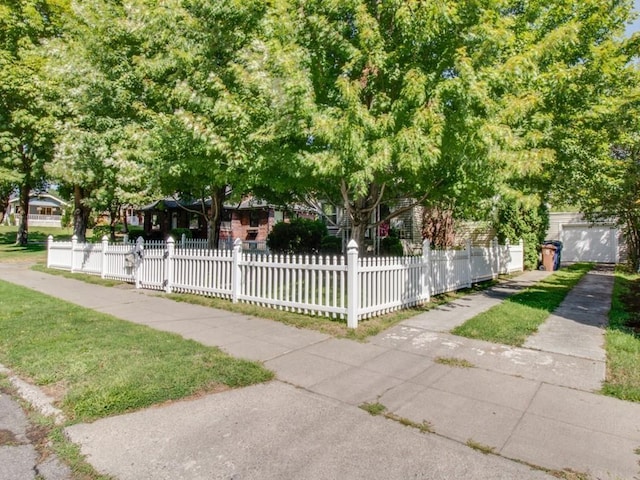 view of front facade with a fenced front yard