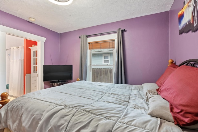 bedroom with a textured ceiling