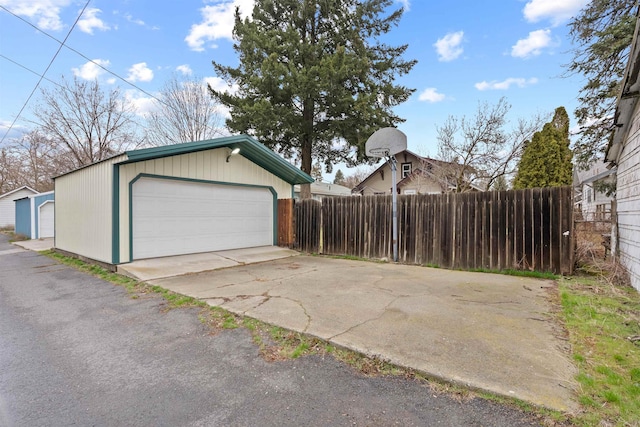 detached garage with fence