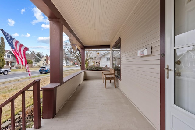 view of patio featuring a porch