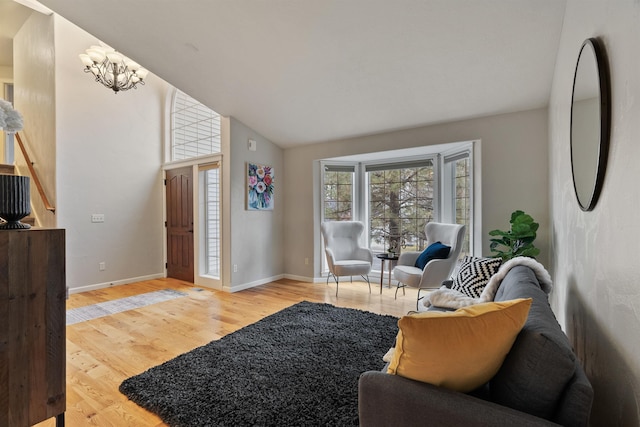 living room featuring baseboards and light wood-style floors