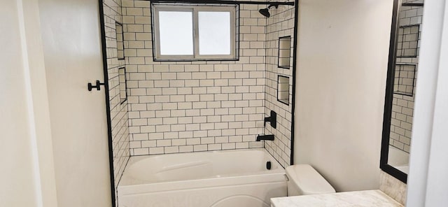 bathroom with vanity, toilet, and shower / bathtub combination