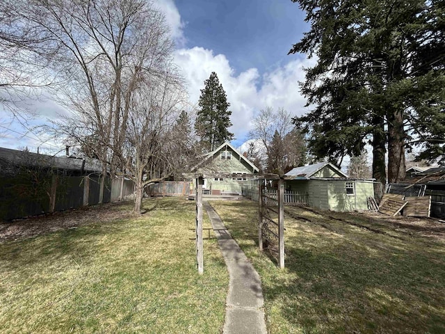 view of yard featuring fence