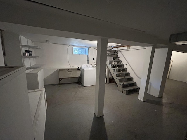 below grade area featuring washer and dryer and stairway