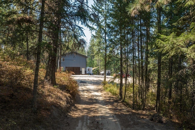 view of street featuring driveway