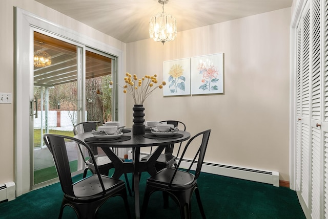 dining area with a baseboard radiator and a notable chandelier