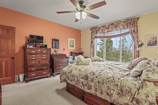 bedroom featuring carpet flooring and a ceiling fan