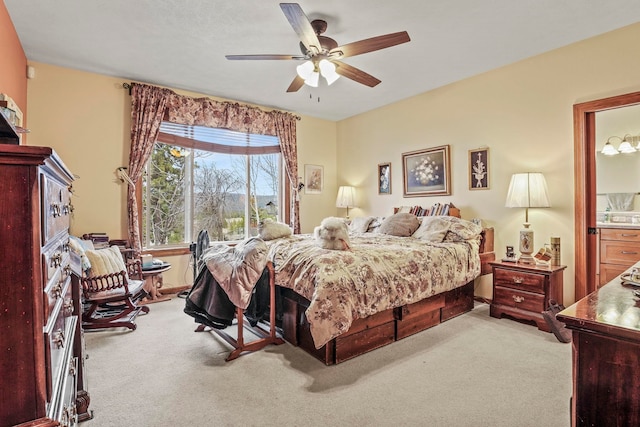 bedroom featuring ceiling fan and carpet flooring