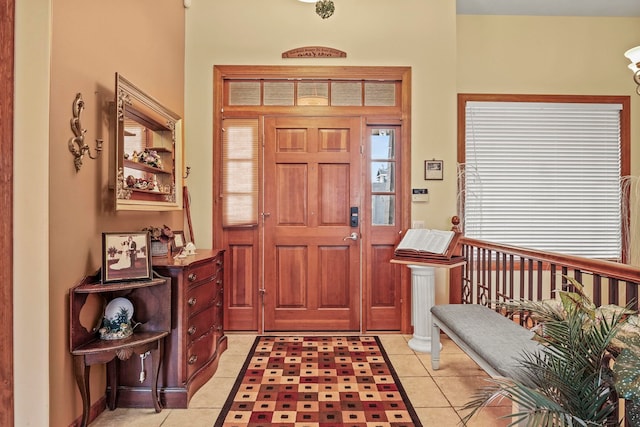 entrance foyer with light tile patterned floors