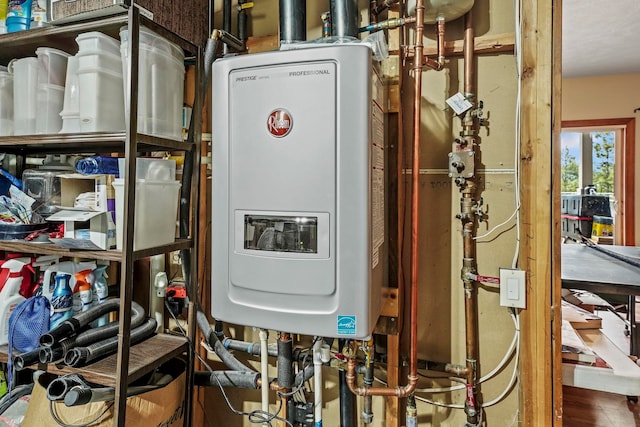 utility room with tankless water heater