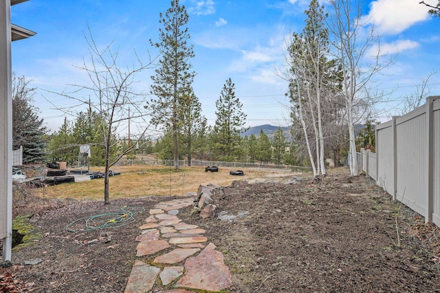 view of yard with fence