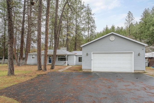 ranch-style house with driveway