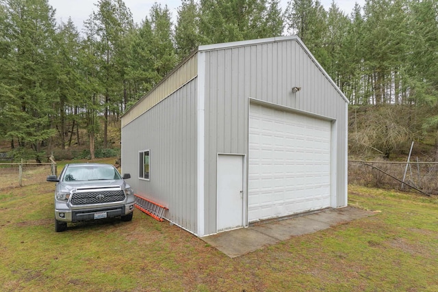 detached garage with fence