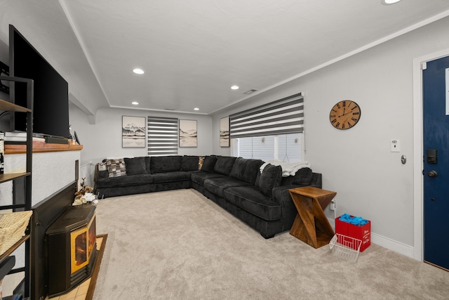 carpeted living room featuring recessed lighting and baseboards