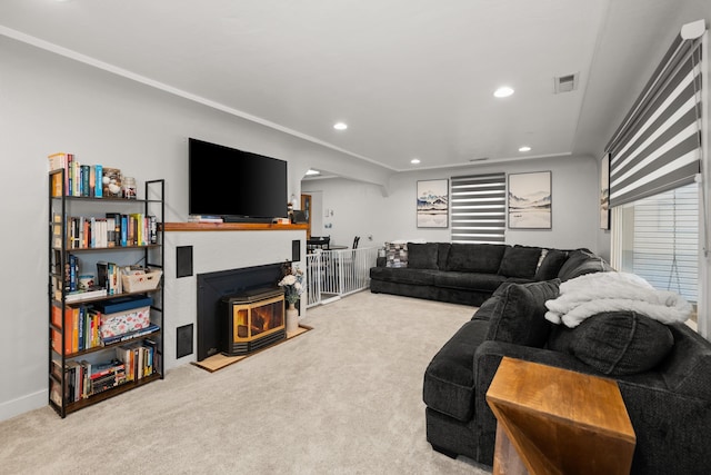 carpeted living room featuring recessed lighting, visible vents, and baseboards