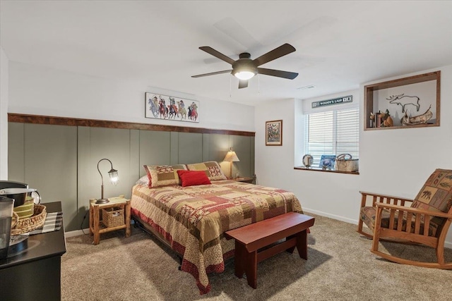 carpeted bedroom featuring visible vents, ceiling fan, and baseboards