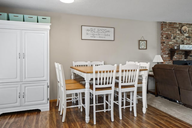 dining area featuring wood finished floors