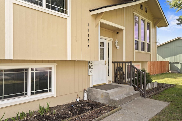 property entrance with fence